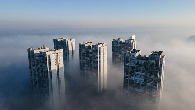 Buildings Emerging from Morning Fog