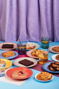 Tasty baked goods on a colourful background