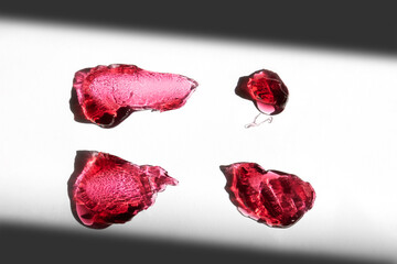 Set of red swatches of gel soap with bubbles. Product cosmetic photo