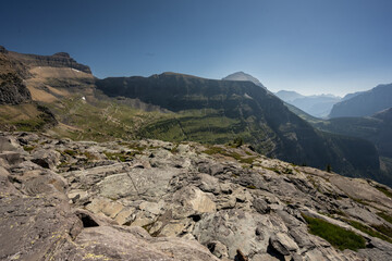Smooth Boulders Overlook The Hole In The Wall In Glacier