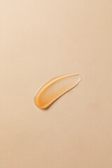 Gel- textured skincare products on the background.