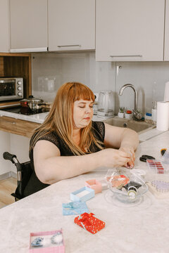 A woman does needlework 