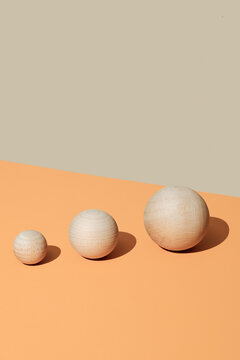 wooden balls of different sizes arranged from smallest to largest