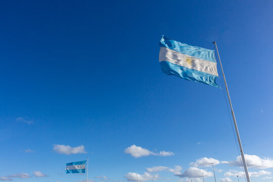 Argentinian Flag Waving in Clear Blue Sky