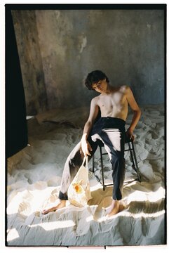 A Contemplative Moment in Soft Sunlight Indoors