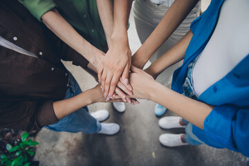 High angle view cropped photo of successful corporate women pile stack handshake office business center indoors