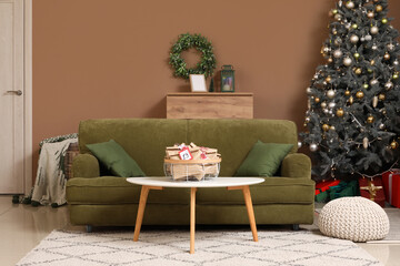 Interior of living room with sofa and Christmas Advent calendar on table