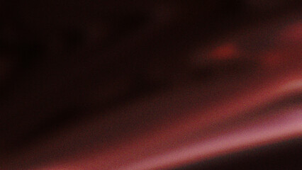 A dark, abstract image with deep red and black hues blending softly, creating a mysterious, moody atmosphere.