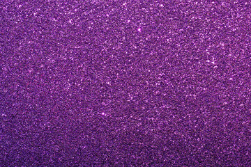 A purple background with glittery purple dots