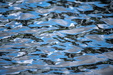 Deep blue sea texture background. Background of aqua sea water surface. Blue sea surface. Aqua water surface. Blue ocean water texture background. Surface of sea.