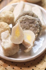 Pempek or empek-empek is a savoury Indonesian fishcake delicacy, made of fish and tapioca, from Palembang, South Sumatera, Indonesia. Pempek is served with rich sweet and sour sauce called cuko