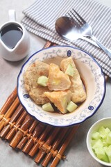 Pempek or empek-empek is a savoury Indonesian fishcake delicacy, made of fish and tapioca, from Palembang, South Sumatera, Indonesia. Pempek is served with rich sweet and sour sauce called cuko