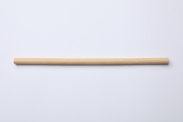 One bamboo drinking straw on white background, above view