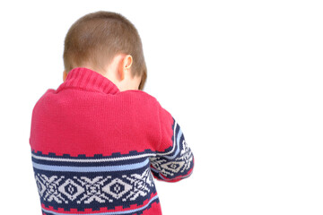 child in sweater turned away, boy 8 years old, mouth twisted in surprise, distressed, shocked news, thinks about problems, stress piled up, concept age-related problems of growing up, an outsider