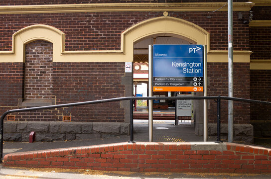 The sign of Kensington railway station. The metro train station is a commuter railway station on the Craigieburn line,  part of the Melbourne railway network in Australia