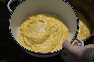 The method of preparation of Balmoşului, Balmoș mămăliga is boiled, in jintita (or jintuial), with butter and sheep cream. Specialty in Romania, Ardeal, Bistrita 2024