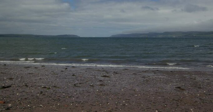 Wide shot of Stranraer West Beach looking up loch ryan