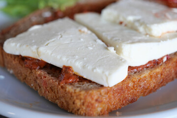 A delicious sandwich with feta cheese and sundried tomatoes is perfect for any meal