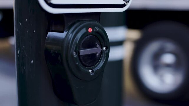 Pedestrian crosswalk arrow button at intersection 4k
