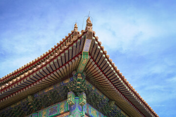 Fototapeta premium Roof design of the building structure in Forbidden City China. Close up view.