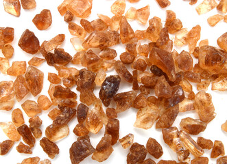 Brown sugar cubes isolated on white background