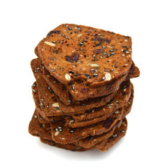 Slices of brown bread with nut on white background