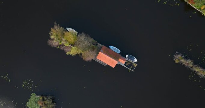 Small recreational houses at Scheendijk, water and recreational area, Loosdrechtse plassen. Aerial drone video