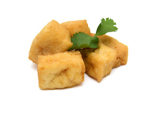 Fried tofu on a white background
