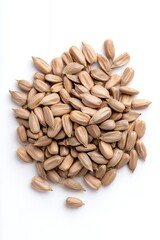 A pile of raw sunflower seeds isolated on a white background.
