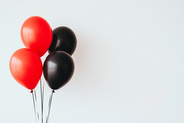 Flying black and red glossy balloons on white background. Black Friday sale. Happy Birthday, Father’s Day, Men’s Day, Halloween. Celebrating event, party. Banner with copy space