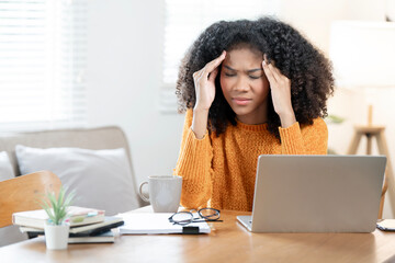 Tired african-american business woman with headache at office, feeling sick at work, copy space