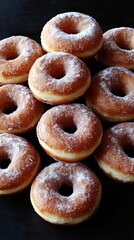 Delicious Sugar-Coated Donuts in a Tempting Stack on Dark Wooden Background Perfect for Breakfast or Dessert Lovers Seeking Sweet Pastry Inspiration