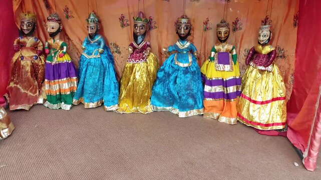 puppets on a puppet show stage in colorful background