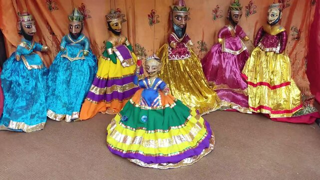 Colorful puppets showing a puppet show with stage in background