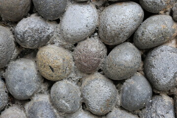 Sea stones texture background. small pebbles or stone in garden. Abstract shape pattern from nature.