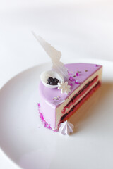 Delicious pink cake decorated with white chocolate