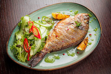 fried dorado with fresh salad
