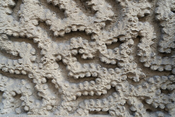 Swirl plaster texture on building side
