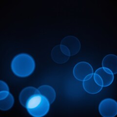 Abstract blurred bokeh lights on dark blue background 