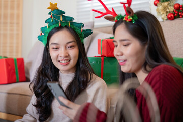 Interracial Couple Enjoying Festive Digital Interaction During Holiday Season