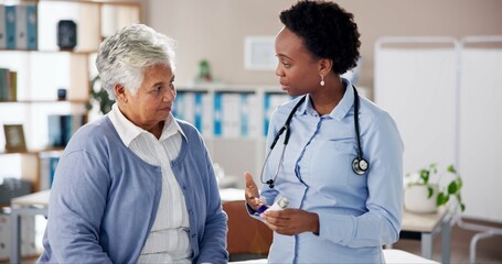 Doctor, senior woman and explain with inhaler for asma, breathing and services for wellness in...