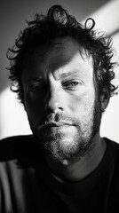 Fototapeta premium Dramatic black and white portrait with backlit effect