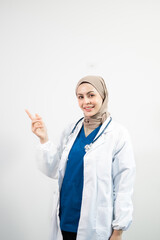 Muslim Arab person. The face of a female doctor on an isolated white background.