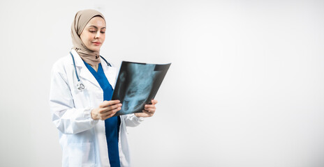 Muslim Arab person. The face of a female doctor on an isolated white background.