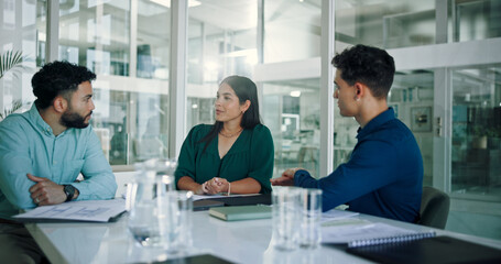Fototapeta premium Meeting, interview and business people in office with woman, discussion and proposal for project management. Growth, development and team in conference room for workshop, planning and strategy ideas