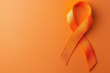 World Multiple Sclerosis Day. Horizontal banner. Copy space. Orange ribbon on a orange background for leukemia, kidney cancer, multiple sclerosis RSD awareness