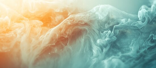 Abstract background of swirling smoke with orange and blue colors.