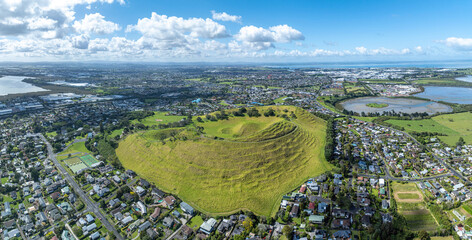 Aerial view of Mangere Mountain in the suburb of Mangere Bridge, Auckland, New Zealand