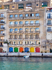 buildings seen from the sea in Senglea, Malta