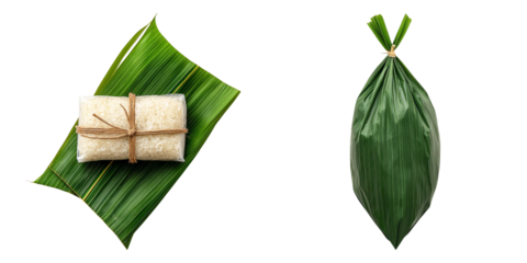 A wrapped rice cake positioned on a green leaf alongside a folded leaf, showcasing traditional culinary presentation.